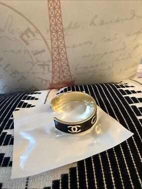 CHANEL Black and Silver Logo Cuff Bracelet